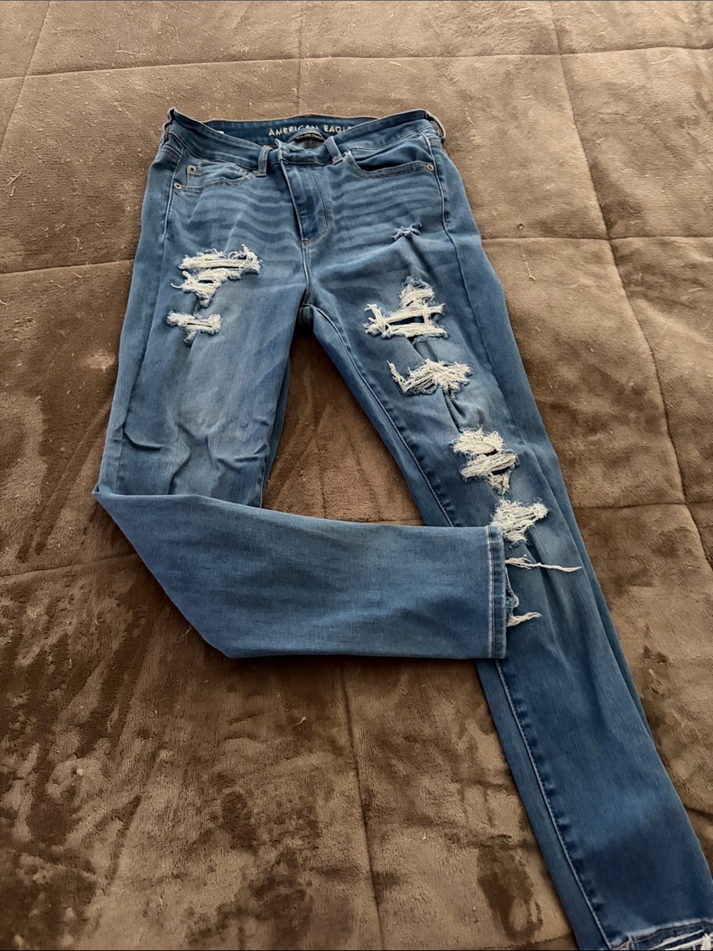 American Eagle Outfitters Ripped Skinny Jeans in Medium Blue Wash